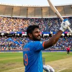 Sanju Samson celebrating a half-century in the India blue jersey during a T20 match.
