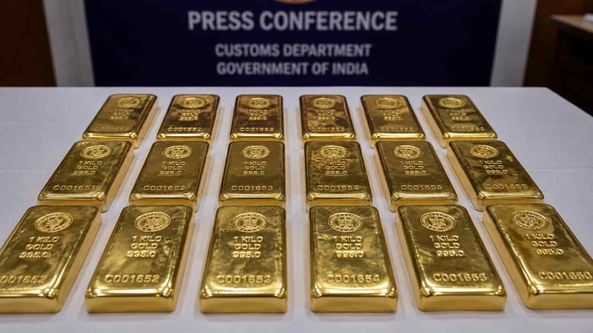 Foreign-origin gold bars seized by DRI officers displayed on a table after a raid at Nagpur Railway Station